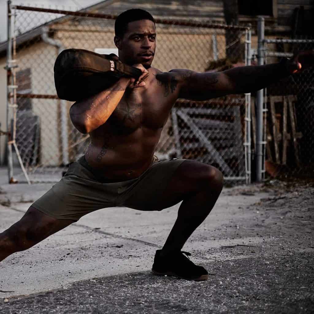GORUCK Sand Kettlebells 26lbs with an athlete 2