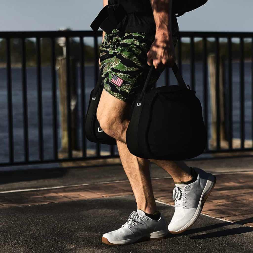 GORUCK Sand Kettlebells 53lbs with an athlete 2